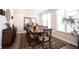 Spacious dining area with a large table, decorative mirror, and ample natural light at 8194 Bostic Ct, Fishers, IN 46038
