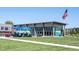 Inviting outdoor area with blue umbrellas and seating, perfect for enjoying a meal in the community at 8194 Bostic Ct, Fishers, IN 46038