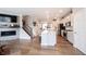 Bright kitchen with white cabinets, stainless appliances, and a central island offering plenty of space at 8194 Bostic Ct, Fishers, IN 46038