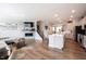Spacious open floor plan showing the living room, staircase, and kitchen area at 8194 Bostic Ct, Fishers, IN 46038