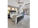 Bright bedroom with a high ceiling, ceiling fan, and view from the windows over looking the exterior at 827 N Park Ave, Indianapolis, IN 46202