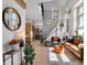 Elegant living room with a modern staircase and decor at 827 N Park Ave, Indianapolis, IN 46202