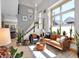 Bright living area with staircase, and natural light at 827 N Park Ave, Indianapolis, IN 46202