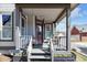 Cozy front porch with a swing and seating, perfect for relaxing at 827 N Park Ave, Indianapolis, IN 46202