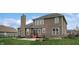 Spacious backyard with patio, perfect for outdoor entertaining and relaxation at 8536 Blue Marlin Dr, Indianapolis, IN 46239