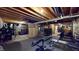 Partially finished basement with gym equipment, providing ample space for recreation at 8536 Blue Marlin Dr, Indianapolis, IN 46239