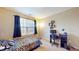 Bedroom featuring large windows, natural light, and a comfortable sleeping and working area at 8536 Blue Marlin Dr, Indianapolis, IN 46239