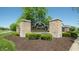 Stone monument at Marlin Meadows entrance with landscaping, green bushes and trees at 8536 Blue Marlin Dr, Indianapolis, IN 46239