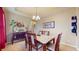 Inviting dining area showcasing a dining table, elegant decor, and ample natural light at 8536 Blue Marlin Dr, Indianapolis, IN 46239