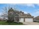 Charming two-story home featuring a brick and brown siding exterior and a two-car garage at 8536 Blue Marlin Dr, Indianapolis, IN 46239