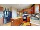 Functional kitchen with center island, modern appliances, and cabinetry, offering a practical cooking space at 8536 Blue Marlin Dr, Indianapolis, IN 46239