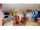 Open concept living area with view of kitchen, dining table and comfortable seating at 8536 Blue Marlin Dr, Indianapolis, IN 46239