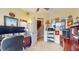 Well-lit office space, featuring a desk, ample storage, and patriotic decor at 8536 Blue Marlin Dr, Indianapolis, IN 46239