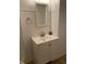 Bathroom featuring a vanity with storage and a mirror above sink area at 937 N Bosart Ave, Indianapolis, IN 46201