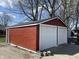 Side view of a two-car garage showing new siding and doors at 937 N Bosart Ave, Indianapolis, IN 46201