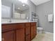 The bathroom features a double vanity and large mirror at 9694 Angelica Dr, Noblesville, IN 46060