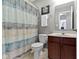 Bathroom featuring a vanity with a light countertop and decorative shower curtain at 9694 Angelica Dr, Noblesville, IN 46060