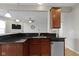 This kitchen features black granite counters and stainless steel appliances at 9694 Angelica Dr, Noblesville, IN 46060