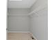This walk-in closet has wire shelving and neutral walls and carpeting at 9694 Angelica Dr, Noblesville, IN 46060