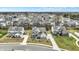 An appealing aerial view reveals homes that are surrounded by green lawns and a tranquil atmosphere at 10237 Sand Run Ln, Fortville, IN 46040