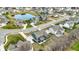 Beautiful aerial view features the neighborhood pond and mature landscaping that accents the neighborhood at 10237 Sand Run Ln, Fortville, IN 46040