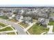 The orderly layout of houses and tree-lined streets create an inviting environment at 10237 Sand Run Ln, Fortville, IN 46040