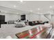 Basement featuring neutral carpet, a dining area, comfortable seating, and ample space at 10237 Sand Run Ln, Fortville, IN 46040
