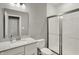 A sleek bathroom with a glass-enclosed shower, modern vanity, and minimalist design for a clean and refreshing space at 10237 Sand Run Ln, Fortville, IN 46040