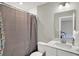 Well-appointed bathroom with a modern vanity, sleek fixtures, and a pristine shower-tub combination at 10237 Sand Run Ln, Fortville, IN 46040