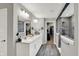 Double vanity in bathroom features a walk in shower, and entry to walk-in closet at 10237 Sand Run Ln, Fortville, IN 46040