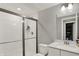 Contemporary bathroom with a glass-enclosed shower, sleek vanity, and bright lighting for a fresh, modern feel at 10237 Sand Run Ln, Fortville, IN 46040