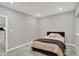 Comfortable bedroom with neutral tones, plush carpet, and soft lighting, providing a relaxing ambiance at 10237 Sand Run Ln, Fortville, IN 46040