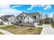 Beautiful two-story home with a well-manicured lawn and attached two car garage at 10237 Sand Run Ln, Fortville, IN 46040