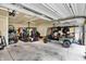 Spacious garage with ample room for vehicles and storage, perfect for car enthusiasts and hobbyists at 10237 Sand Run Ln, Fortville, IN 46040