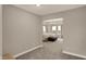 Open bedroom layout with trey ceilings, neutral paint, and carpeted floors is adjacent to the Primary at 10237 Sand Run Ln, Fortville, IN 46040