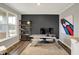 Modern home office featuring stylish desk, shelving, and a neutral color scheme at 10237 Sand Run Ln, Fortville, IN 46040