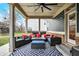 Inviting outdoor seating area with plush cushions and a patterned rug at 10237 Sand Run Ln, Fortville, IN 46040