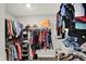 Bright walk-in closet with built-in shelving and ample storage for clothes, shoes, and accessories at 10237 Sand Run Ln, Fortville, IN 46040