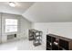 Bedroom featuring a window, desk, air conditioning unit, and shelving at 110 E Hendricks St, Shelbyville, IN 46176