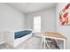 Cozy bedroom showcasing a daybed, a side table, and natural light, complemented by plush carpeting at 11598 Platt St, Noblesville, IN 46060