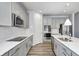 Well-appointed kitchen with stainless steel appliances, shaker cabinets, and a tile backsplash at 11598 Platt St, Noblesville, IN 46060