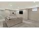 Large finished basement featuring recessed lighting and a cozy sectional sofa at 1238 Alabama St, Indianapolis, IN 46202