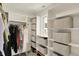 Organized walk-in closet with shelving and hanging racks, offering ample storage space at 1238 Alabama St, Indianapolis, IN 46202
