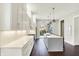 Bright and airy kitchen featuring white countertops, cabinets, and dark hardwood floors at 1238 Alabama St, Indianapolis, IN 46202