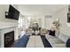 Elegant living room with a fireplace, comfortable seating, and an open layout at 1238 Alabama St, Indianapolis, IN 46202