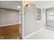 Neutral toned entryway featuring hardwood floors and large window at 1241 Brandt Dr, Indianapolis, IN 46241