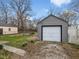 Detached garage offering convenient parking and storage space in the backyard at 1241 Brandt Dr, Indianapolis, IN 46241
