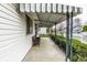 Inviting covered porch with seating, ideal for relaxing outdoors at 1252 Kappes St, Indianapolis, IN 46221