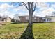 Large backyard with a deck that provides a relaxing spot for outdoor enjoyment at 1330 N Gibson Ave, Indianapolis, IN 46219