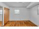 Cozy bedroom with hardwood flooring and closet at 1330 N Gibson Ave, Indianapolis, IN 46219